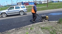 73道路舗装のおじさん　写真.JPGのサムネール画像