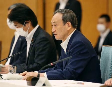 適用地域に８県を加えることを表明する菅首相.JPG